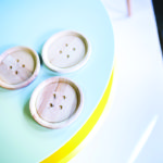 kaboompics.com_Three wooden buttons